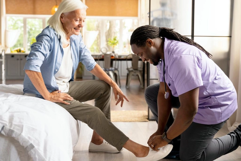 Home care nurse managing medication for elderly patient in Atlanta Georgia